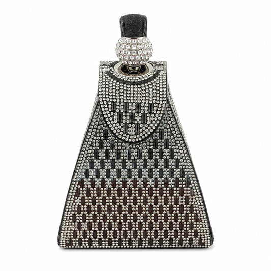 Decorative cowbell with rhinestone pattern on a white background